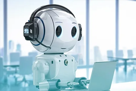 Autonomer KI-Agent im Einsatz Ein humanoider Roboter mit Headset arbeitet an einem Laptop in einem modernen Büro.
