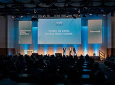 Auftakt zu #GOB2030 im Februar 2026 Blick auf die Bühne beim Auftakt zu #GOB2030 vor einem voll besetzten Veranstaltungssaal.
