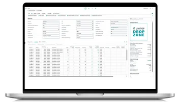 Laptop mit Cargo-Management-Maske in unitop: Containerdaten, ETD/ETA-Termine und Belegzeilen